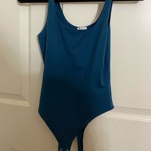 garage blue bodysuit